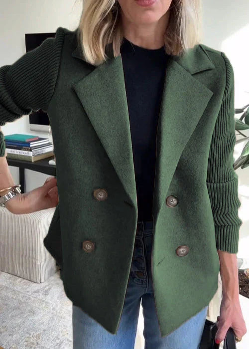 Elegant tailored Lumière™ coat by Les Odettes, featuring a sleek design and classic fit, displayed on a hanger.