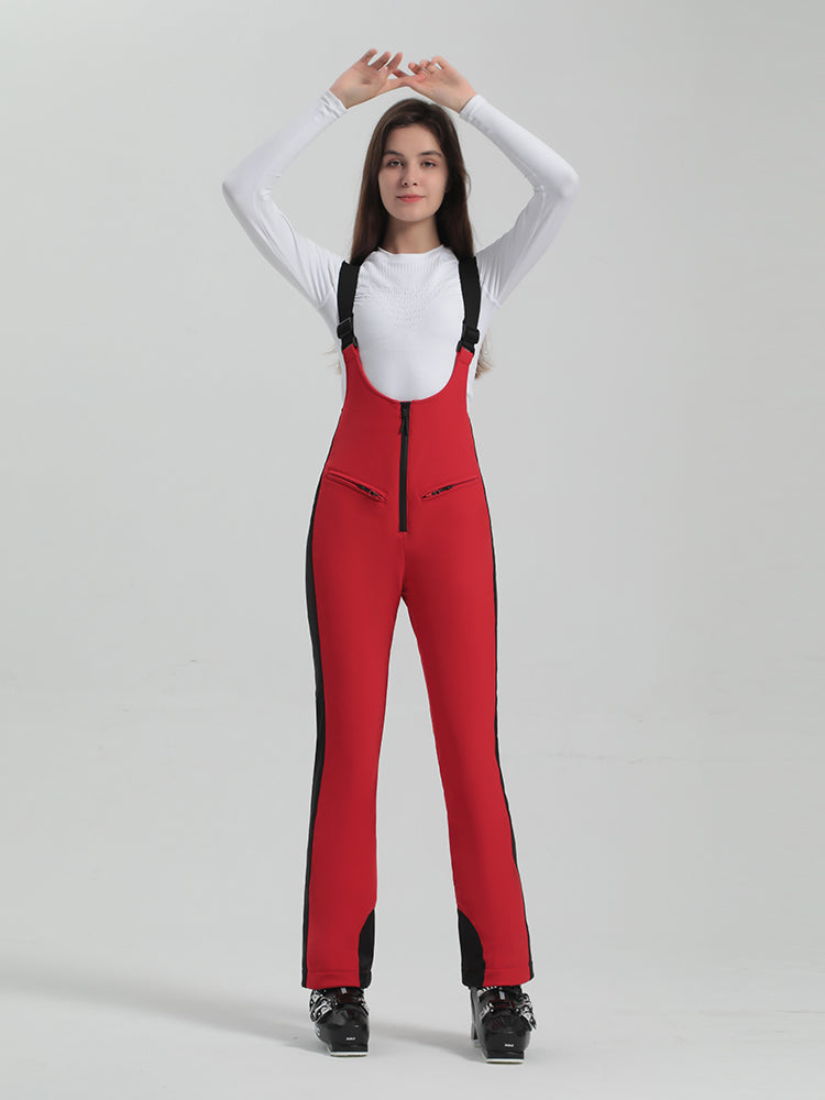 Les Odettes Gsou Snow Women's multi-color stretch fabric ski bibs, showing the vibrant, fitted snowboard and ski pants design.