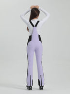 Les Odettes Gsou Snow women's multi-color stretch fabric ski bibs, snowboard pants with adjustable straps and waterproof material.