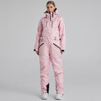 Les Odettes women's one-piece winter snowboard ski snowsuit in practical, stylish design with a fitted hood and snow-resistant fabric.