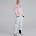 Les Odettes women's one-piece winter snowboard ski snowsuit with a practical and stylish design, suitable for cold weather outdoor activities.