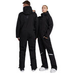 Les Odettes women's one-piece snowboard snowsuit in stylish winter snowboarding gear, featuring a practical and warm ski suit design.