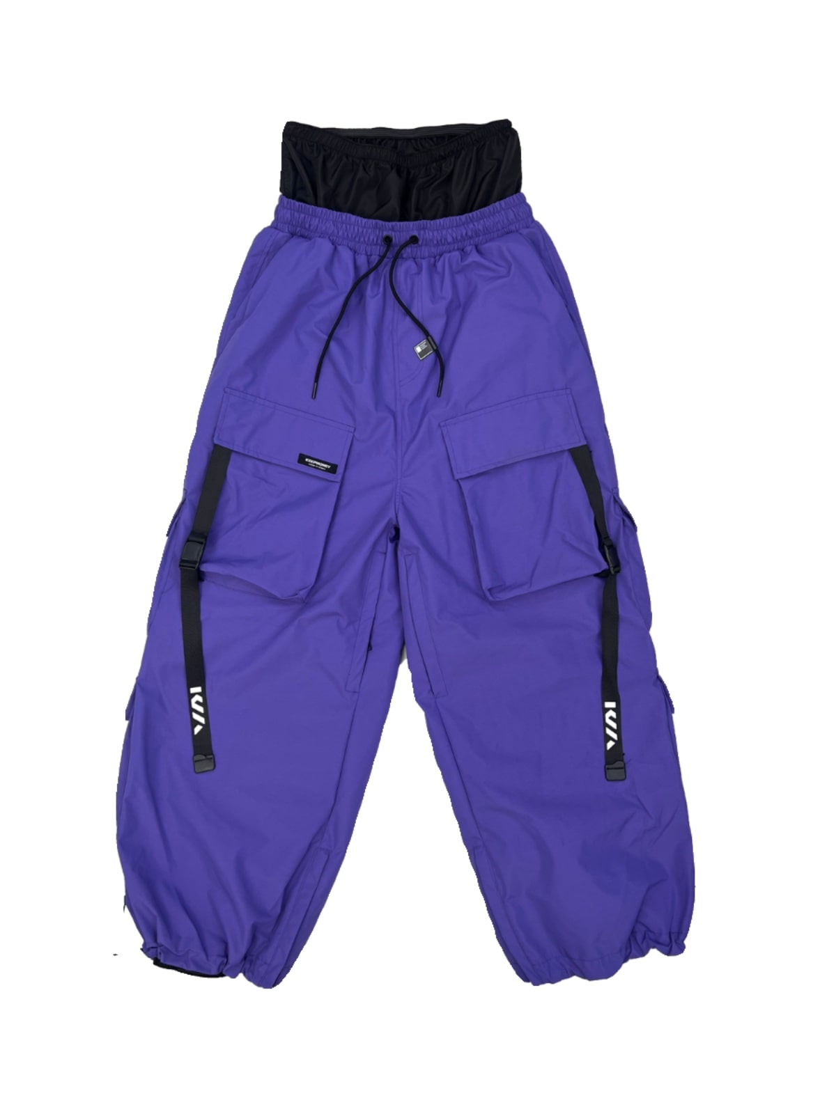 Men's Les Odettes snow pants with a relaxed fit, baggy style, designed for cold weather and snow activities.