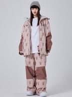 Women's Les Odettes snow rabbit freeride baggy snowsuit with a hood, insulated snowboarding suit for winter outdoor activities.
