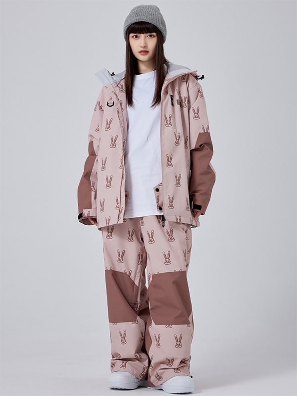 Women's Les Odettes snow rabbit freeride baggy snowsuit with a hood, insulated snowboarding suit for winter outdoor activities.