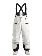 Les Odettes women's snow pants, Gsou Snow Durable Mountain Pro cargo bibs, with reinforced fabric and adjustable straps for winter outdoor activities.