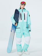 Women's Arctic Queen Slope Star Icon ski suit by Les Odettes, winter snow jumpsuit, featuring a stylish one-piece design with star icon details.