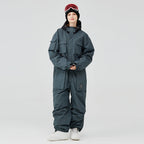 Women’s Arctic Queen IceStorm mountain adventure one-piece snowsuit by Les Odettes, featuring insulated design and snow-resistant fabric.