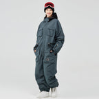 Les Odettes Women's Arctic Queen IceStorm mountain adventure one-piece snowsuit in snowy outdoor setting