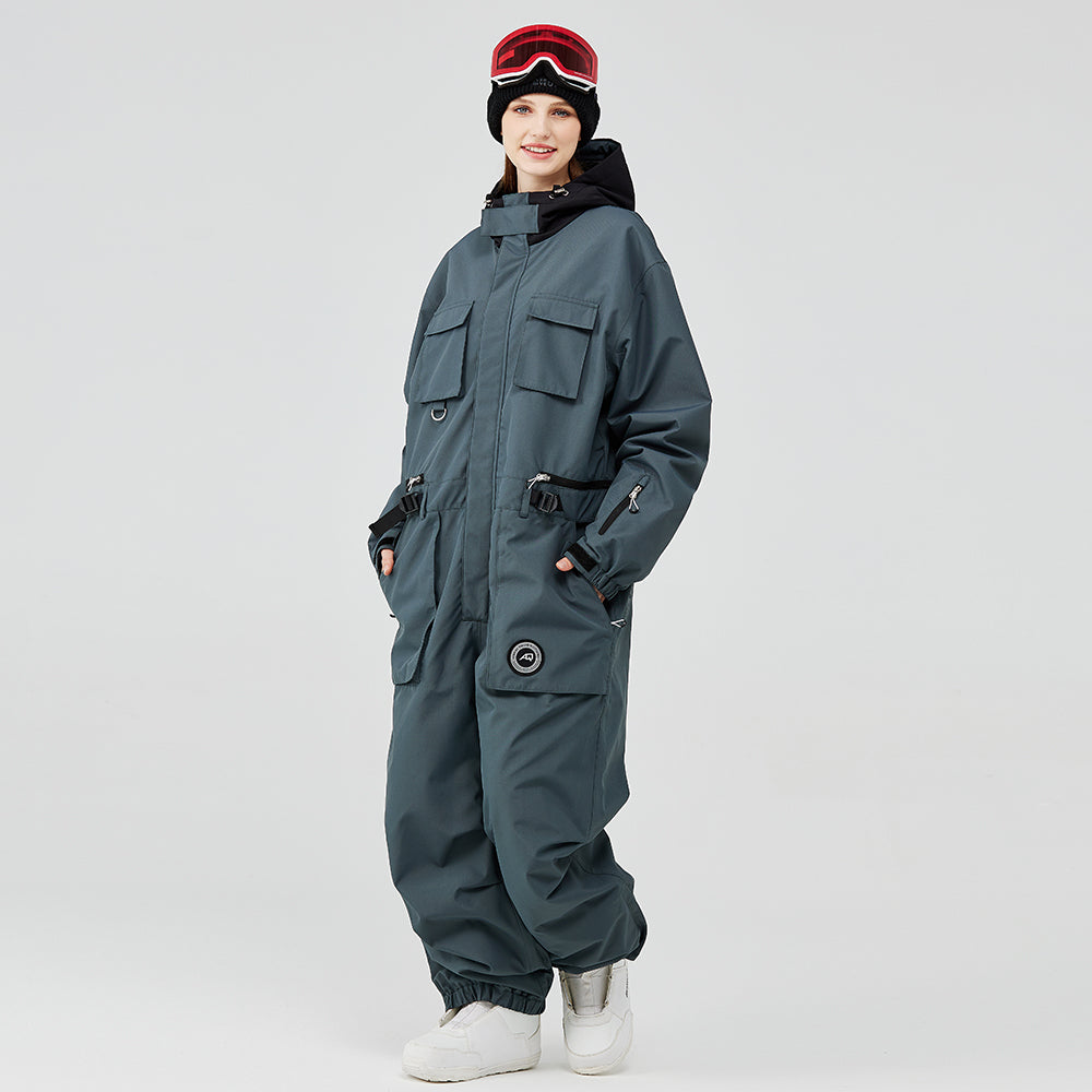 Les Odettes Women's Arctic Queen IceStorm mountain adventure one-piece snowsuit in snowy outdoor setting