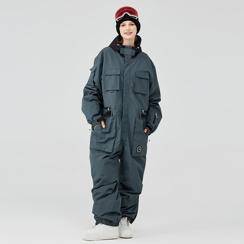 Women's Arctic Queen IceStorm mountain adventure one-piece snowsuit by Les Odettes, featuring insulated winter gear for cold weather.