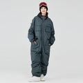 Women's Arctic Queen IceStorm mountain adventure one-piece snowsuit by Les Odettes, featuring insulated winter gear for cold weather.