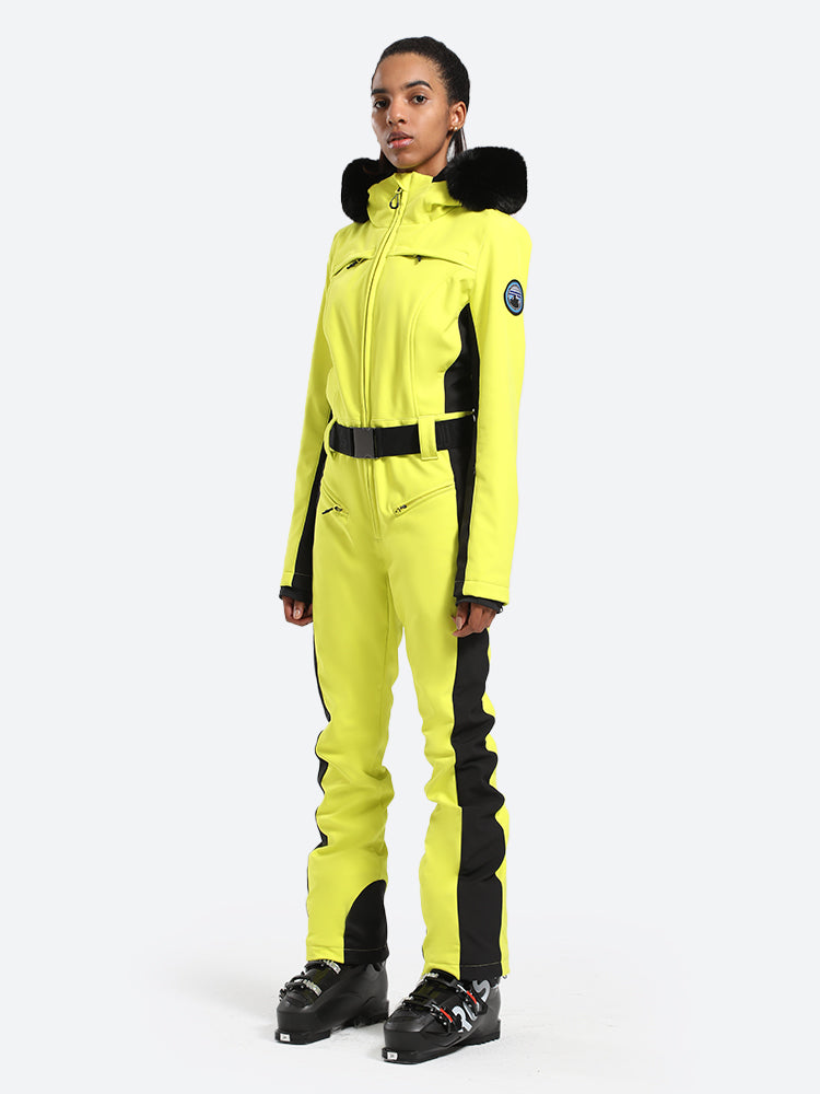 Les Odettes women's classic faux fur one-piece ski suit, stylish winter ski clothing with a sleek fit and cozy fur accents.