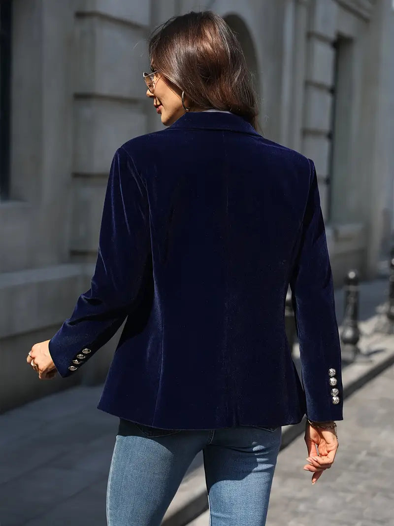 Elegant velvet blazer by Les Odettes featuring a tailored fit and sophisticated design, shown in a rich, deep color.