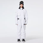 Women's Arctic Queen IceStorm mountain adventure one-piece snowsuit by Les Odettes, featuring insulated design and winter gear details.