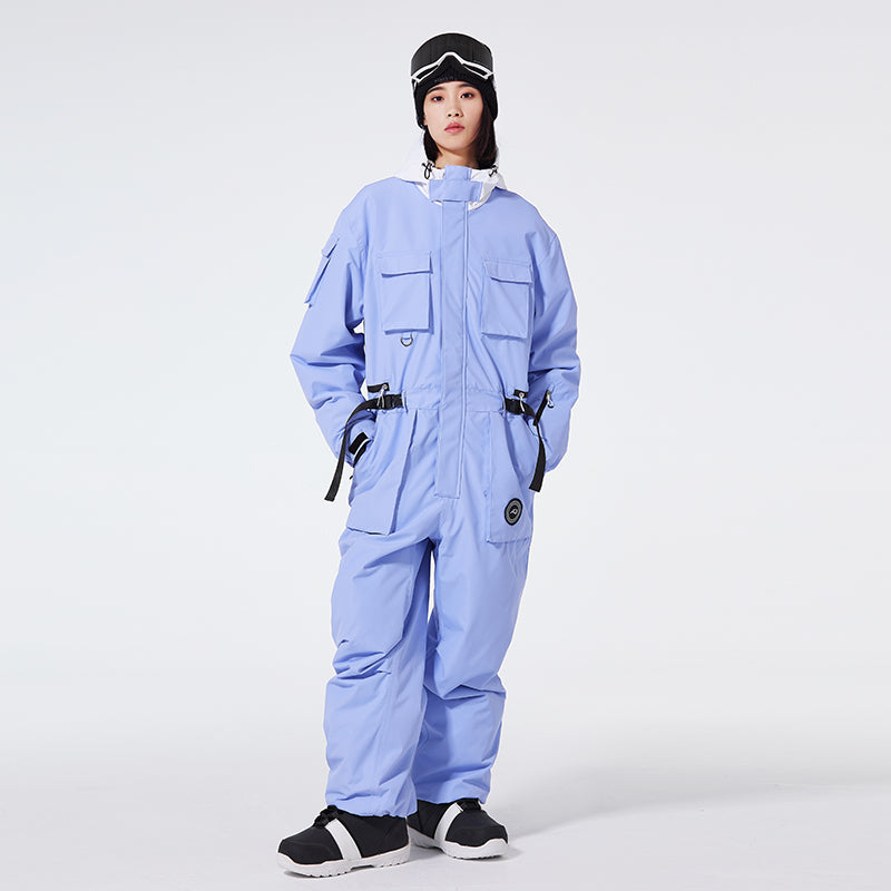 Women's Arctic Queen IceStorm Mountain Adventure one-piece snowsuit by Les Odettes, featuring insulated waterproof winter gear.