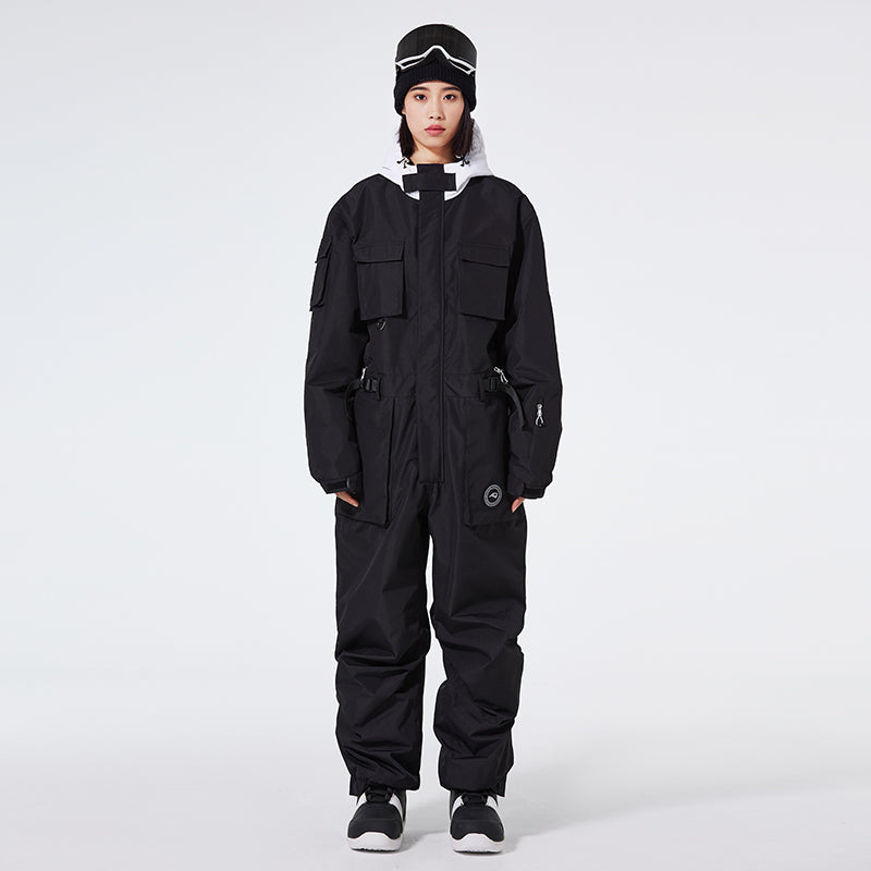Les Odettes Women's Arctic Queen IceStorm mountain adventure one-piece snowsuit with insulated, waterproof design for cold weather outdoor activities.