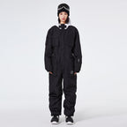 Les Odettes Women's Arctic Queen IceStorm mountain adventure one-piece snowsuit with insulated, waterproof design for cold weather outdoor activities.