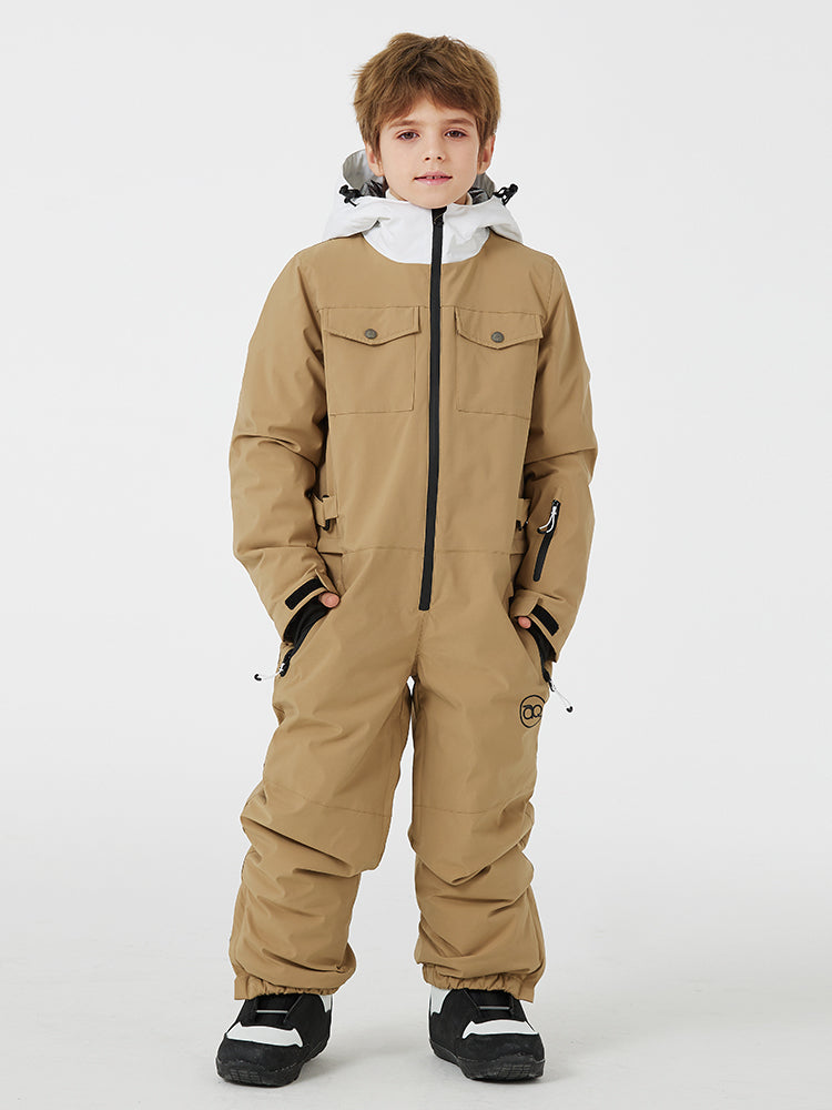 Kids' unisex Mountain Explorer waterproof one-piece snow suit by Les Odettes, featuring a vibrant winter design and insulated material.