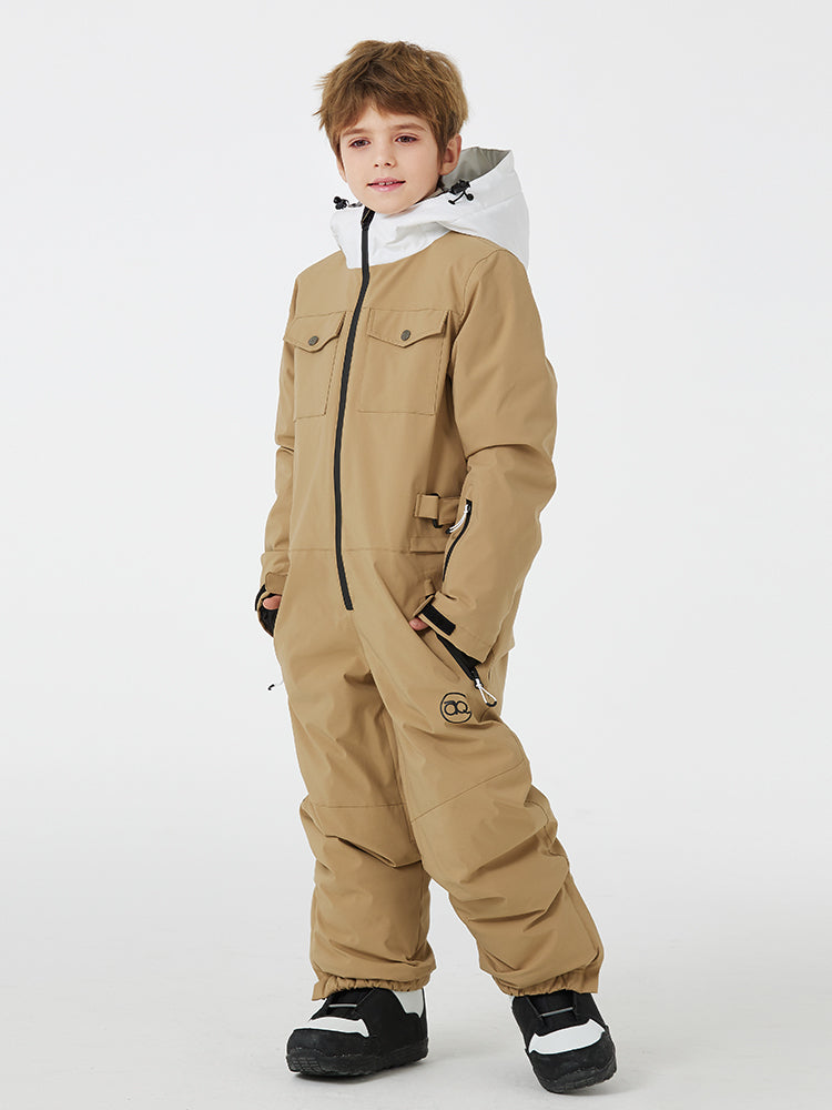 Kid's unisex Mountain Explorer waterproof one-piece snow suit by Les Odettes, featuring a colorful, insulated design for winter outdoor play.
