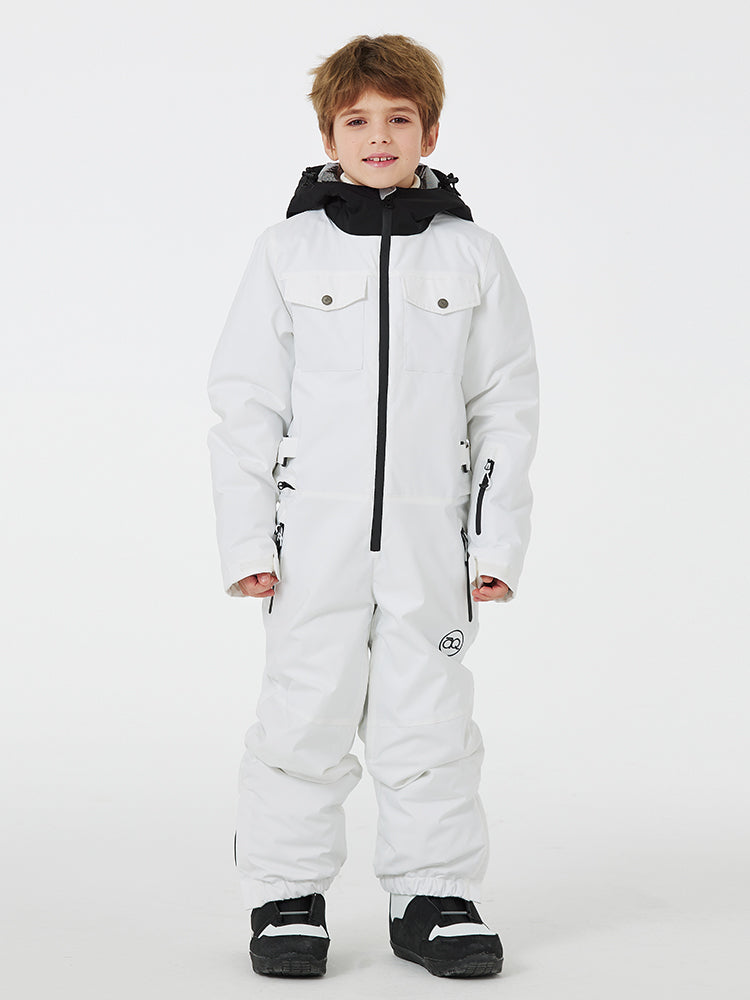 Kids' unisex mountain explorer waterproof one-piece snow suit by Les Odettes, featuring bright colors and winter snow-resistant fabric.