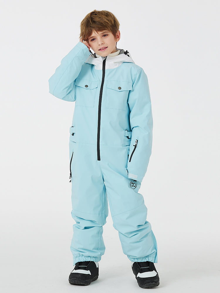 Kid's unisex Les Odettes mountain explorer waterproof one-piece snow suit with hood and zippers, designed for winter outdoor play.