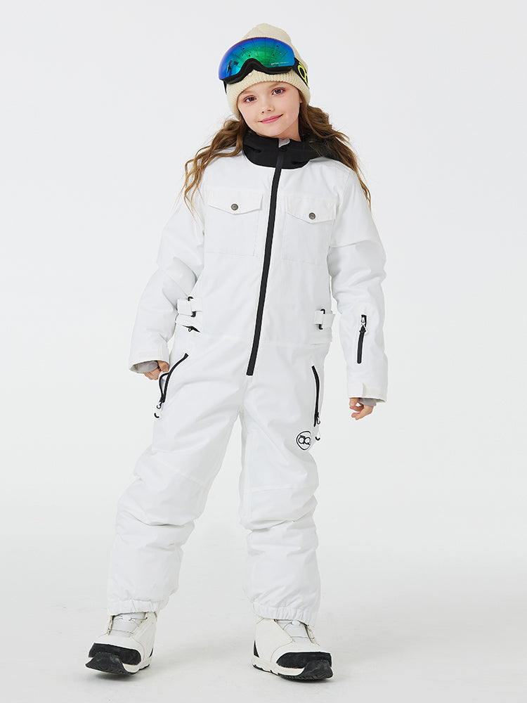 Kid's unisex mountain explorer waterproof one-piece snow suit by Les Odettes, shown in vibrant outdoor winter setting.
