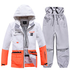 Men's Arctic King winter snowboard suit by Les Odettes, featuring insulated snow jacket and pants set for winter sports.