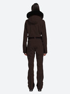 Les Odettes women's classic faux fur one-piece ski suit with hood, front zipper, and insulated design for winter skiing.