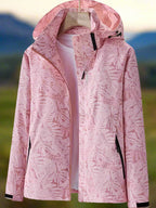 Les Odettes Leslie women's waterproof summer jacket in lightweight vest style, shown in a bright, water-resistant fabric.