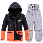 Men's Arctic King winter sport snowboard suit by Les Odettes, featuring a snow jacket and pants set with winter ski gear design.