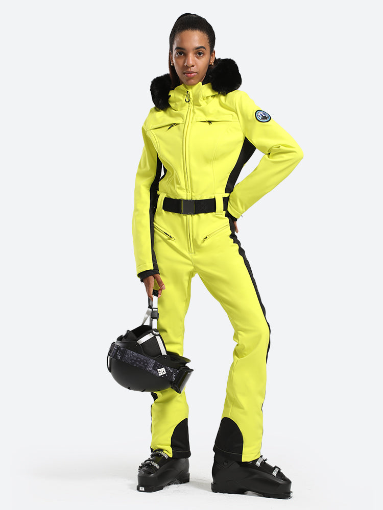 Les Odettes women's classic faux fur one piece ski suit, stylish winter ski gear with a cozy fur collar and waterproof design.