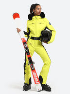 Les Odettes women's classic faux fur one-piece ski suit, insulated ski outfit with hood and front zipper for winter snowboarding.