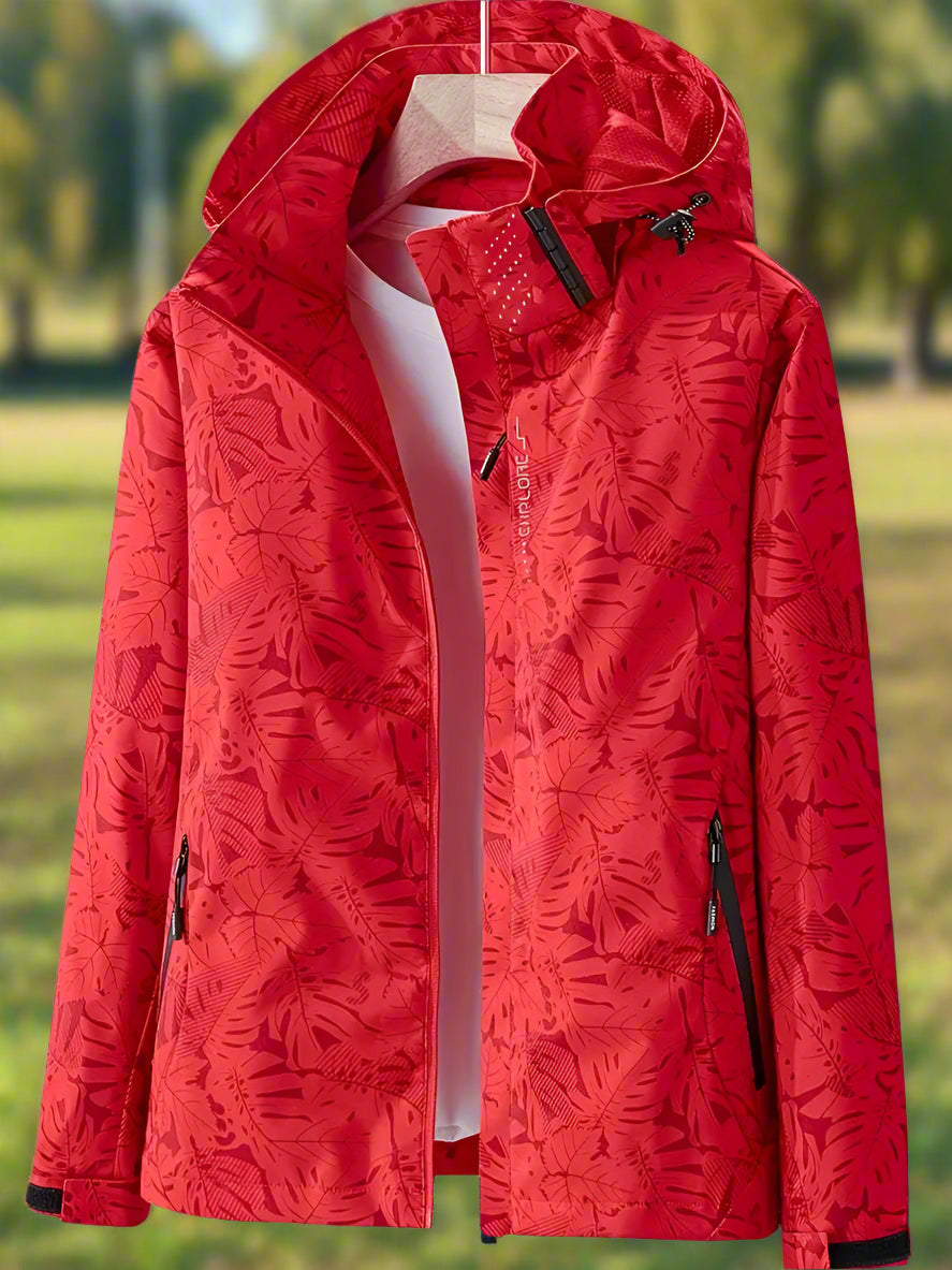 Les Odettes Leslie™ women's waterproof summer jacket, lightweight vest with hood and breathable fabric, suitable for outdoor wear.