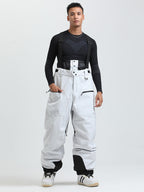 Men's Gsou Snow durable mountain cargo snow bibs pants by Les Odettes, featuring waterproof fabric, multiple pockets, and adjustable straps.