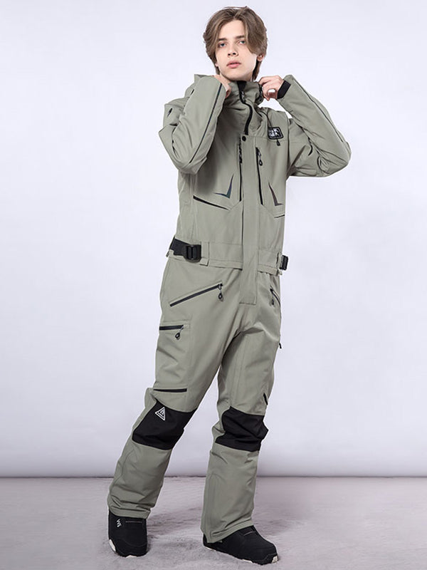 Men's RAWRWAR high land cargo one-piece snowsuit by Les Odettes, featuring a durable winter outer layer with cargo pockets.
