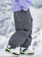 Men's Rabbit Snow StreetFlow Freestyle Cargo Baggy Snow Pants by Les Odettes, showcasing the relaxed fit and durable winter fabric.