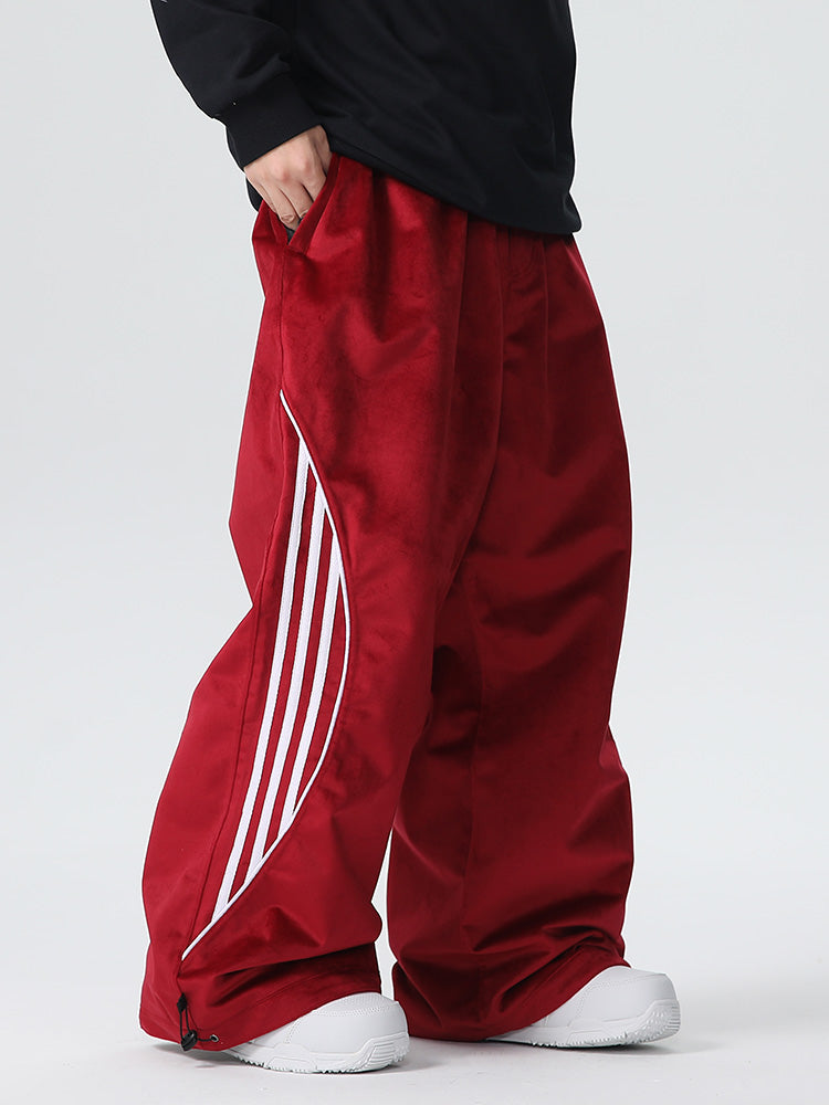 Men's Searipe unisex oversized fleece chilltech snow pants from Les Odettes, featuring a baggy fit and warm fleece material for winter outdoor wear.