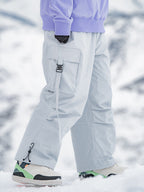 Men's Rabbit Snow UrbanRush Prime Cargo Baggy Snow Pants by Les Odettes, showing the black insulated winter pants with multiple pockets.