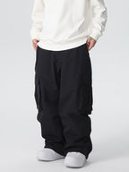 Men's Les Odettes snow pants, durable mountain pro all-function baggy snow pants designed for winter outdoor activities.