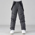 Men's IceGuard Snow Conqueror bib overalls by Les Odettes, waterproof snow pants with adjustable straps and reinforced knees for winter.