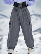 Men's Rabbit Snow StreetFlow Freestyle Cargo Baggy Snow Pants by Les Odettes, showing the relaxed fit and snow-resistant fabric.