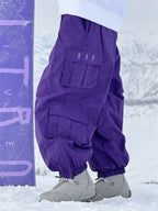 Men's Les Odettes Rabbit Snow Prime Cargo snowboard pants in black with multiple pockets and relaxed fit, suitable for winter snowboarding.