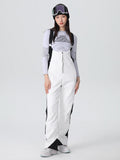 Women's Searipe Retro Vibe ski bibs by Les Odettes, elegant stretch flare ski pants with retro design and adjustable straps.