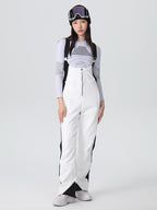 Women's Searipe Retro Vibe ski bibs by Les Odettes, elegant stretch flare ski pants with retro design and adjustable straps.