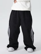 Men's Searipe Unisex Oversize Fleece ChillTech Baggy Snow Pants by Les Odettes, showing the relaxed fit and fleece-lined design.