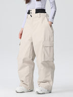 Women's Les Odettes mountain snow pants in durable, all-function baggy style, designed for winter outdoor activities.