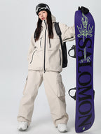 Women's Searipe durable mountain snowboard suit by Les Odettes, featuring waterproof fabric, insulated design, and all-weather performance.