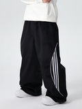 Men's Searipe unisex oversized fleece chilltech snow pants by Les Odettes, featuring a baggy fit and warm fleece material.