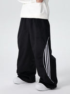 Men's Searipe unisex oversized fleece chilltech snow pants by Les Odettes, featuring a baggy fit and warm fleece material.